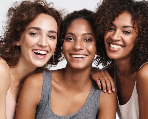 Three smiling women