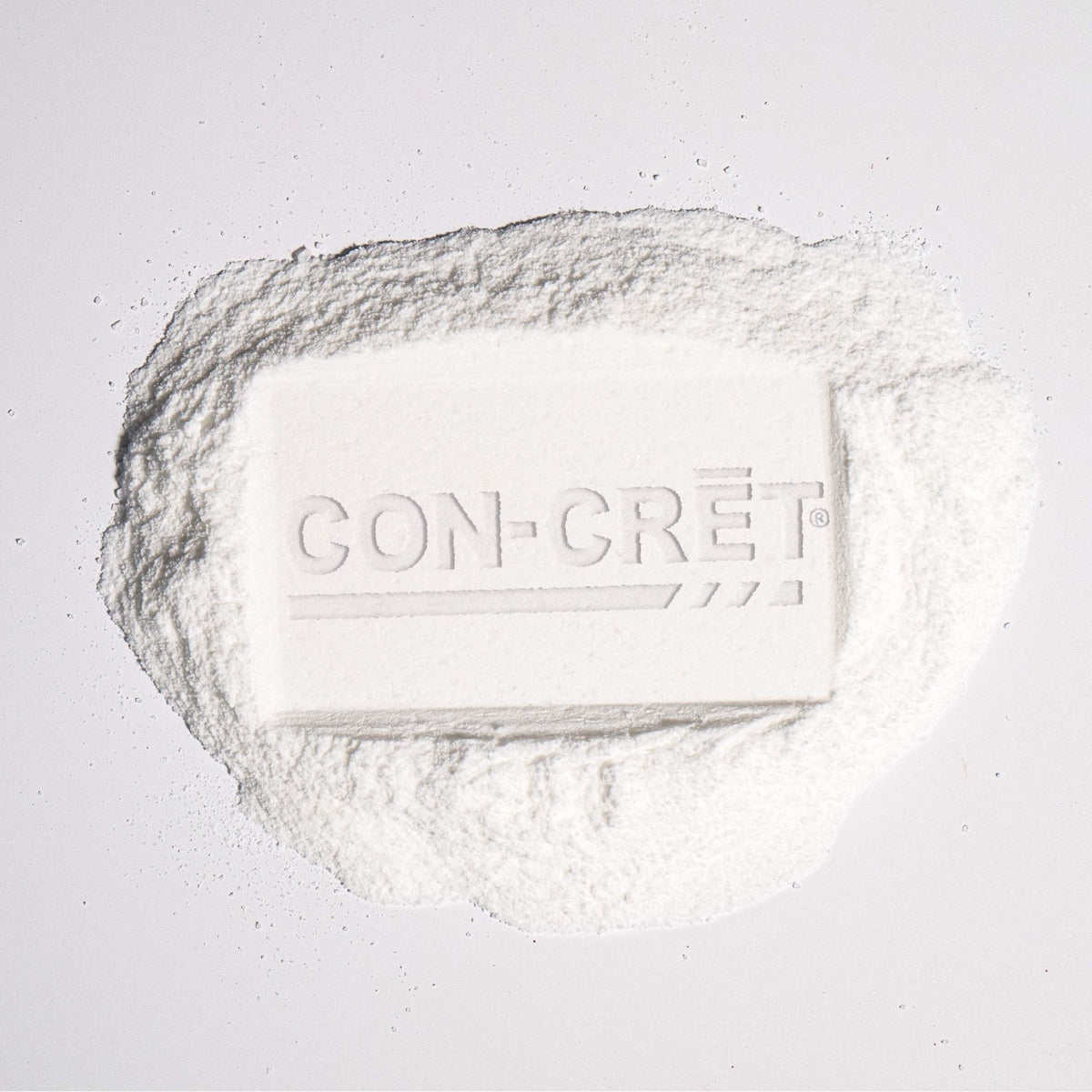 Creatine HCl powder with the CON-CRĒT® Creatine logo imprinted on it